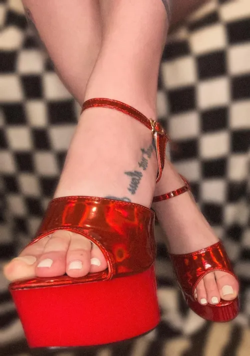 red heels and soft soles ready to be worshipped