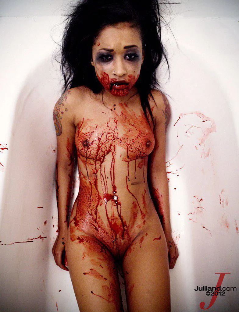 She looks more like a zombie than a vampire. I'm not sure if this is from her QOTD shoot.