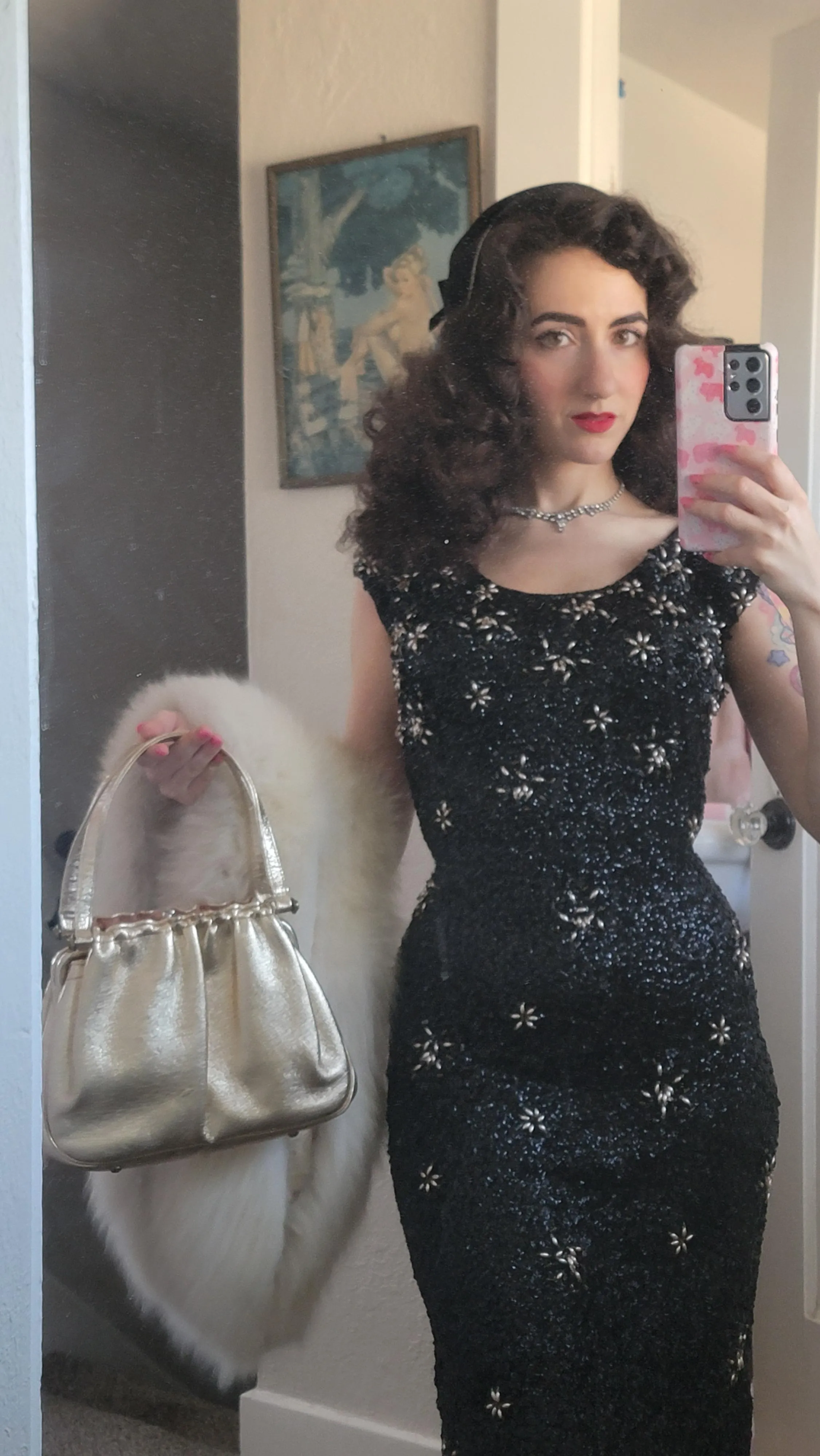 Sometimes it's fun to get all dressed up! Went to a 1950s dinner party 🥰 I love that my naturally curly hair works so well for the 50s look!