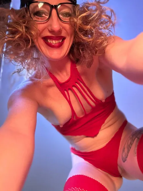 Squatting on your face in red fishnets…