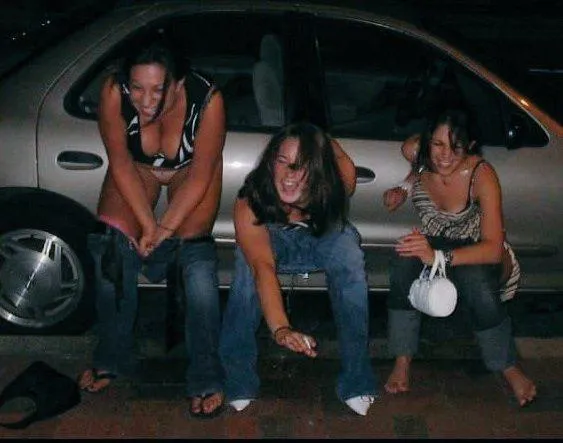 3 girl next to a car