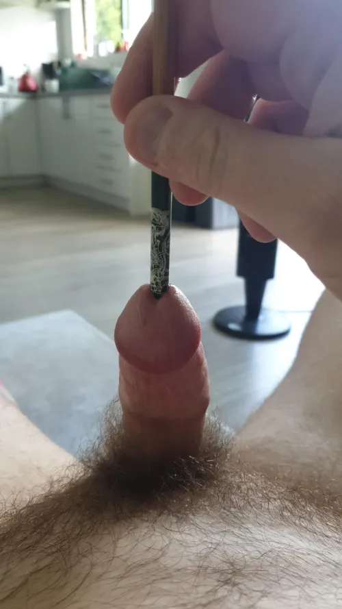 Big end of the chopstick first and the whole thing jammed in