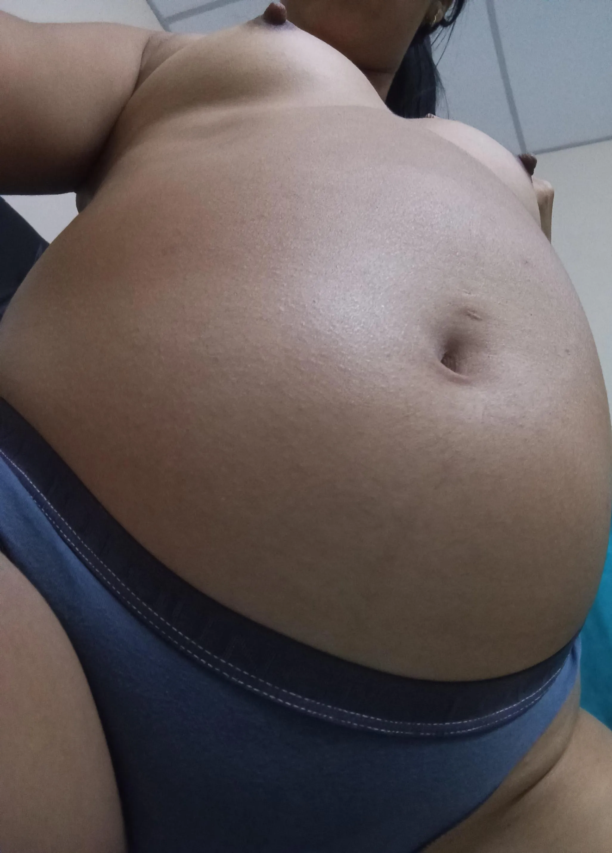 Would you like to see me take off my panties? Pregnancy makes me so horny daddy.