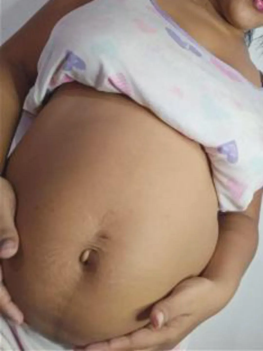 Describe my belly with a sexy word