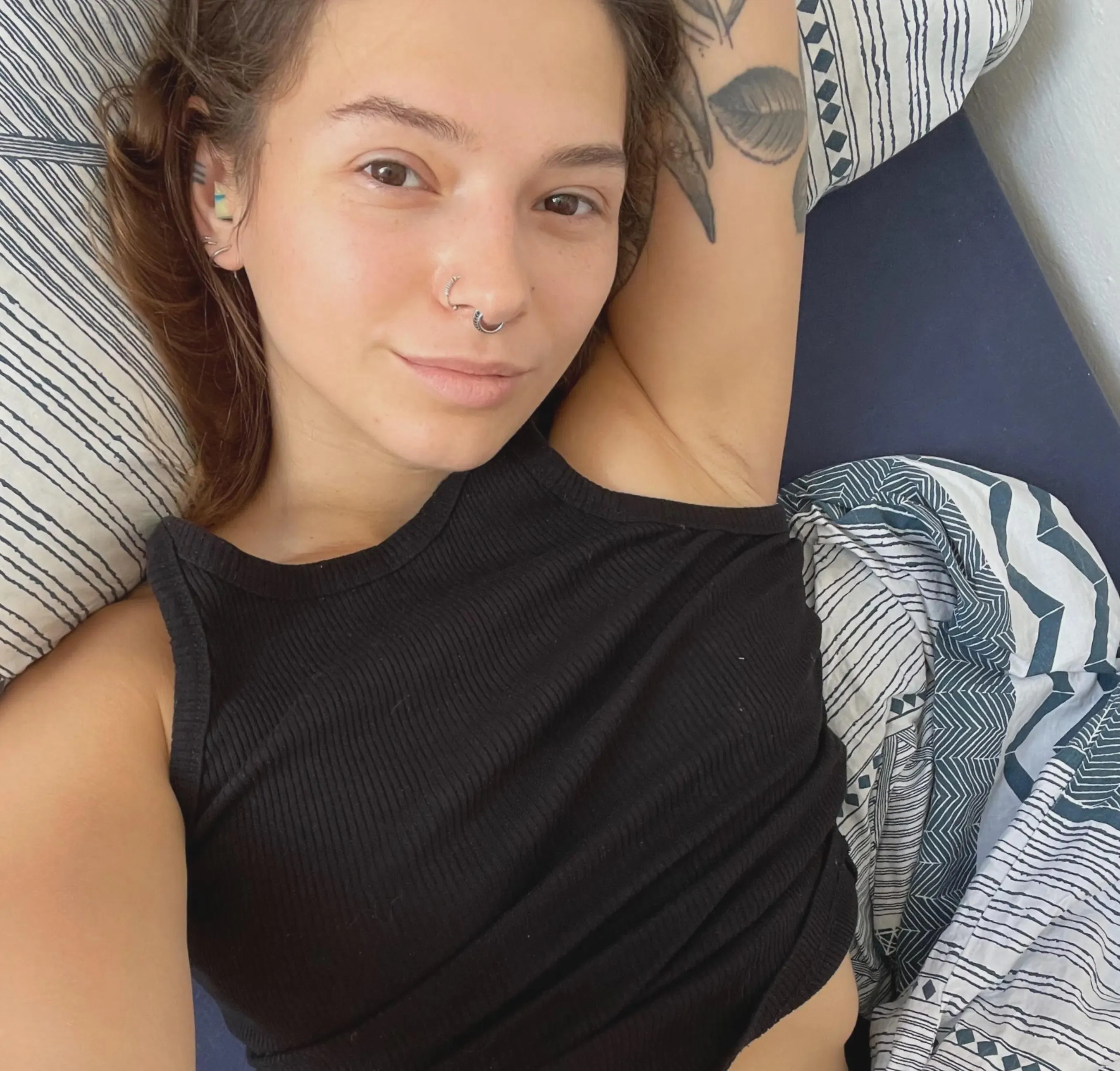 smiling pierced girl likes to have her armpits fondled