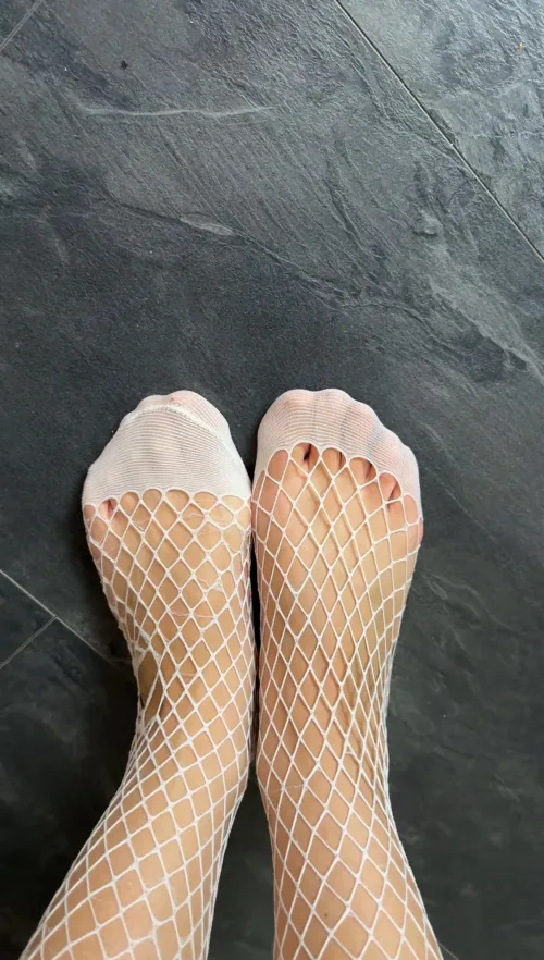 Would you let me to give you a footjob while I'm wearing my stockings?