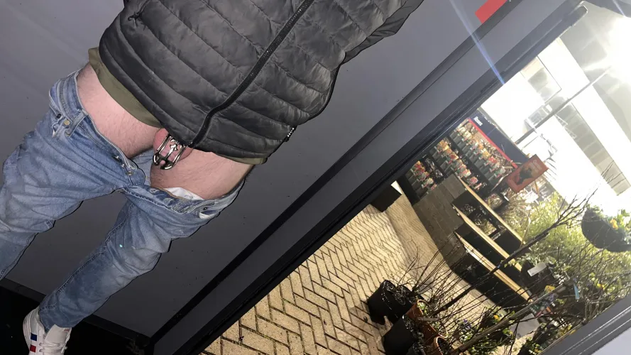 Got his caged cock out at the local garden centre inside a shed