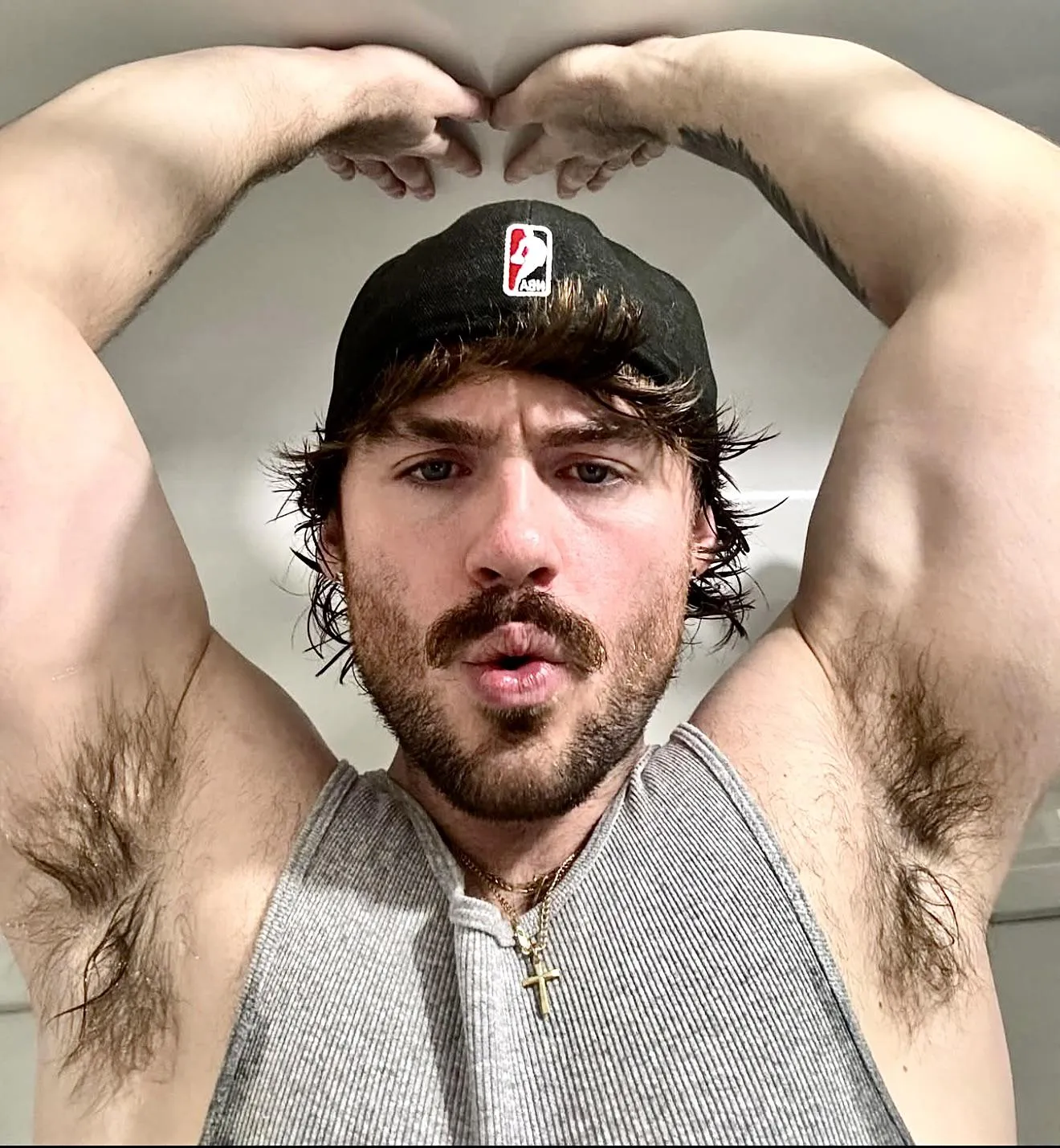 Even he looks amazed by the sight of his beautiful hairy pits 😈