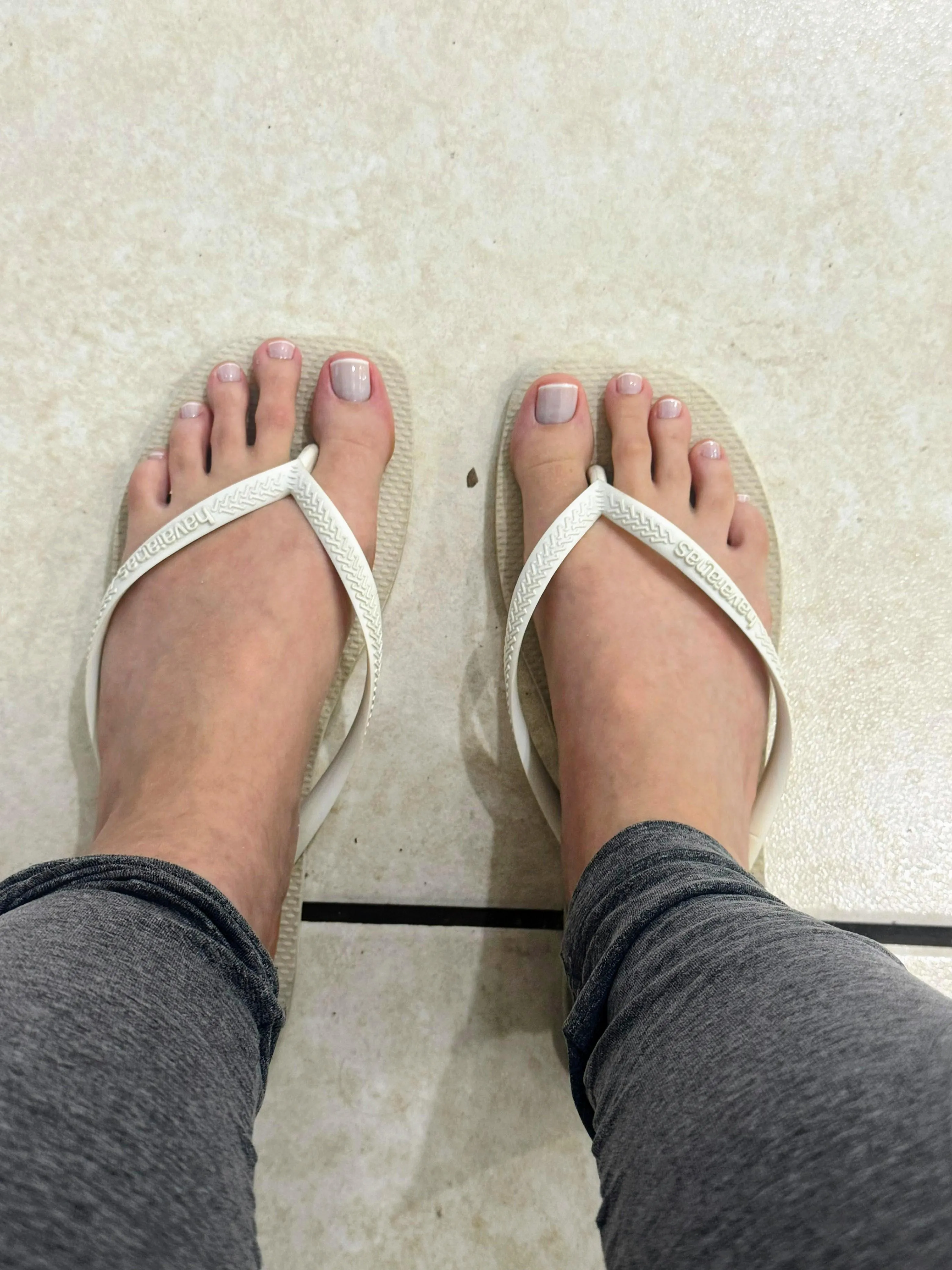 Fresh white pedi and white flip Flops