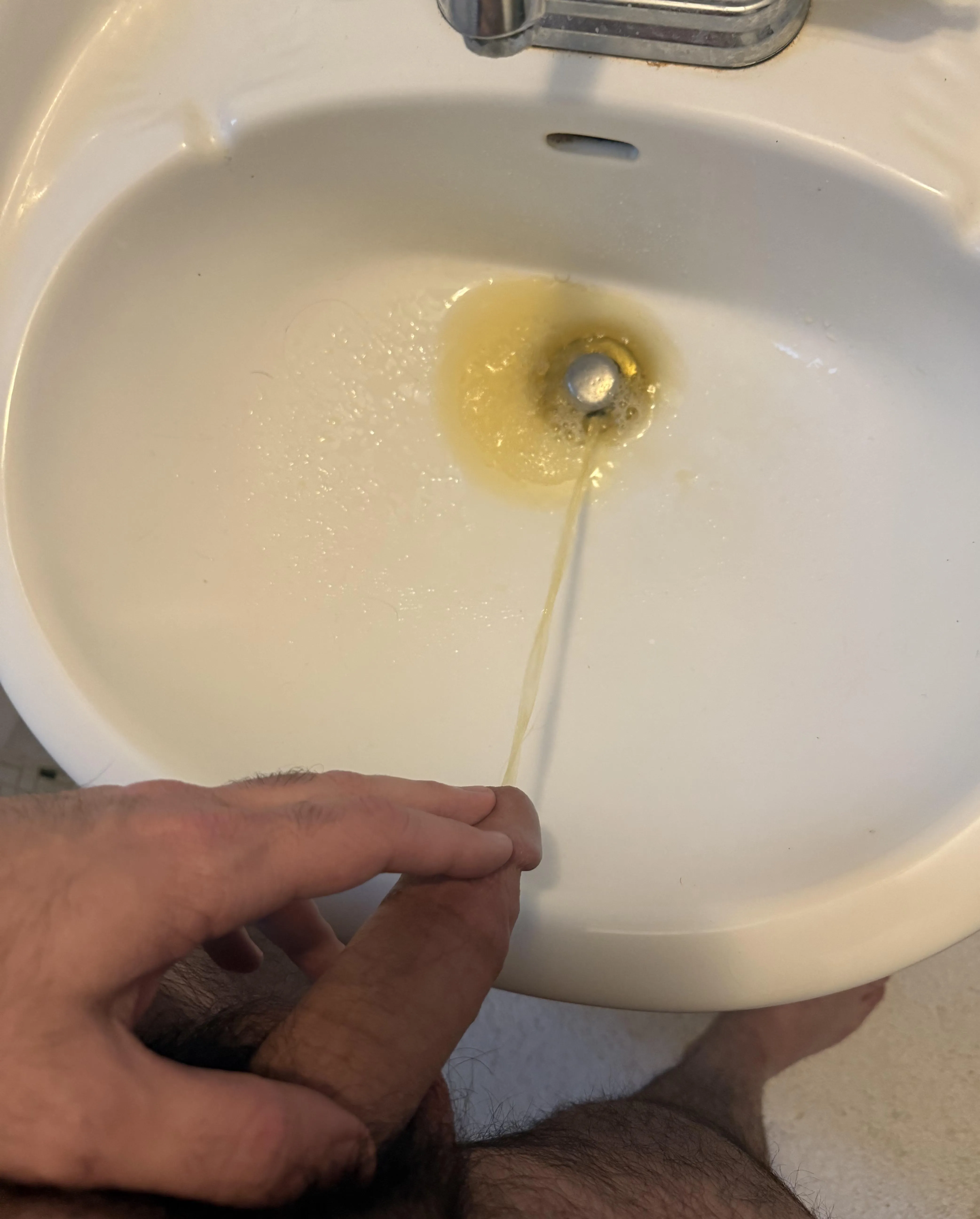 Too hard to aim into the toilet so I used the sink