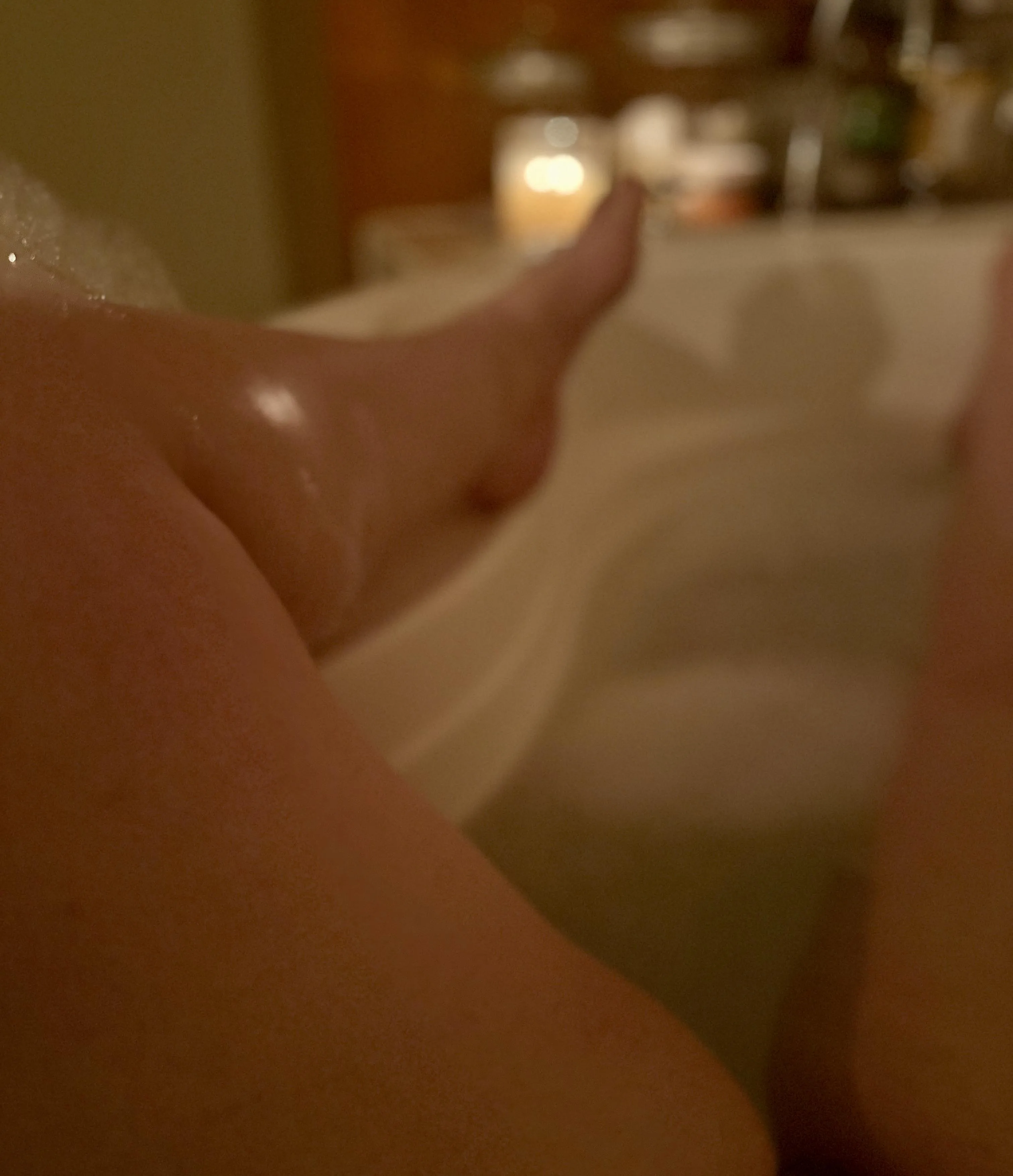 (F) Enjoying some alone time in the bath