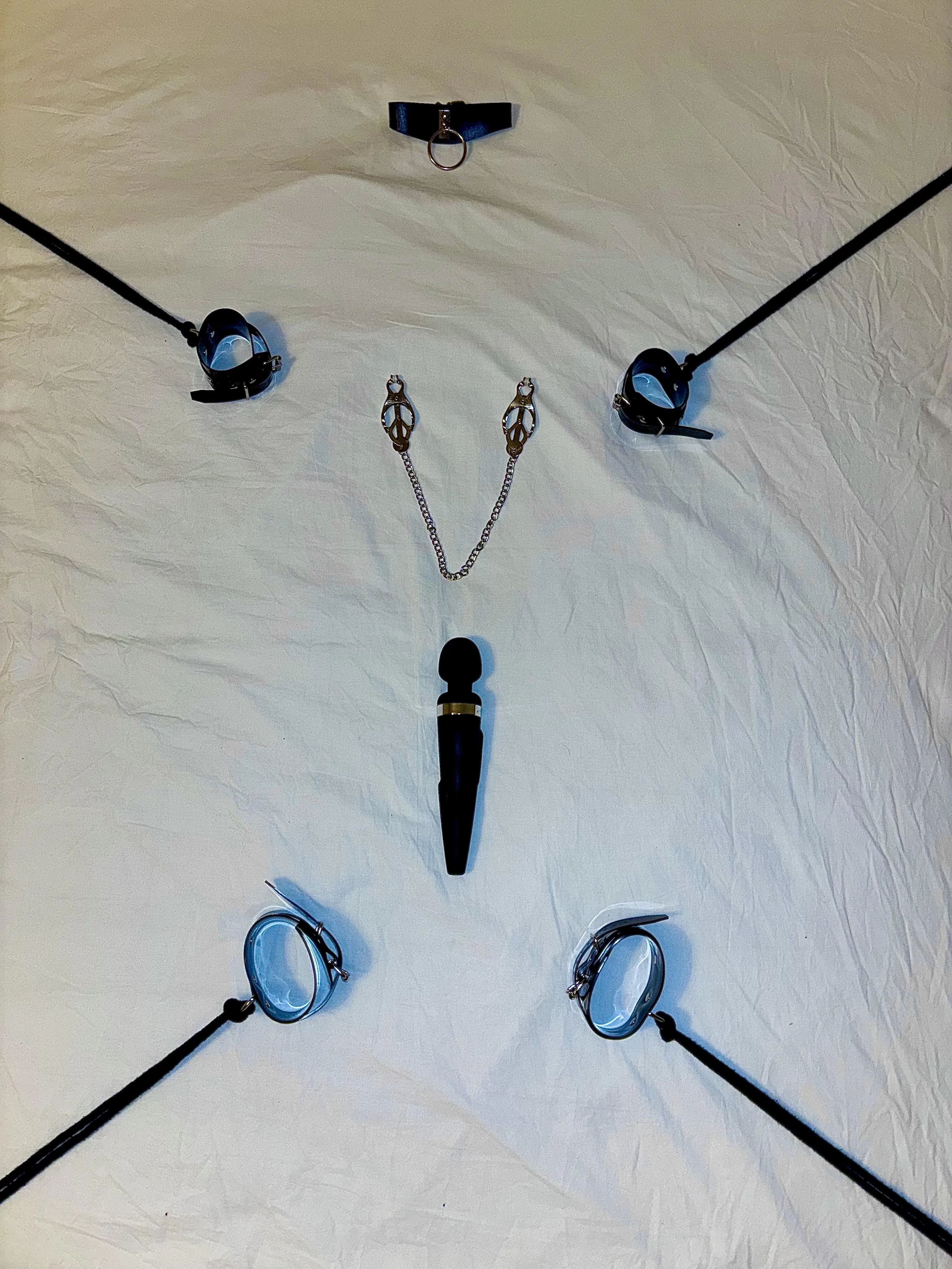 Lie down for your treat(meant) ⛓️🔥! The clamps might hurt a bit - but it is worth the pleasure. Do you dare? 😈🖤