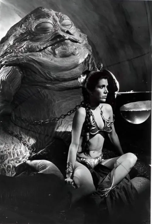 She sits quietly before her Master like a good girl waiting for her next command