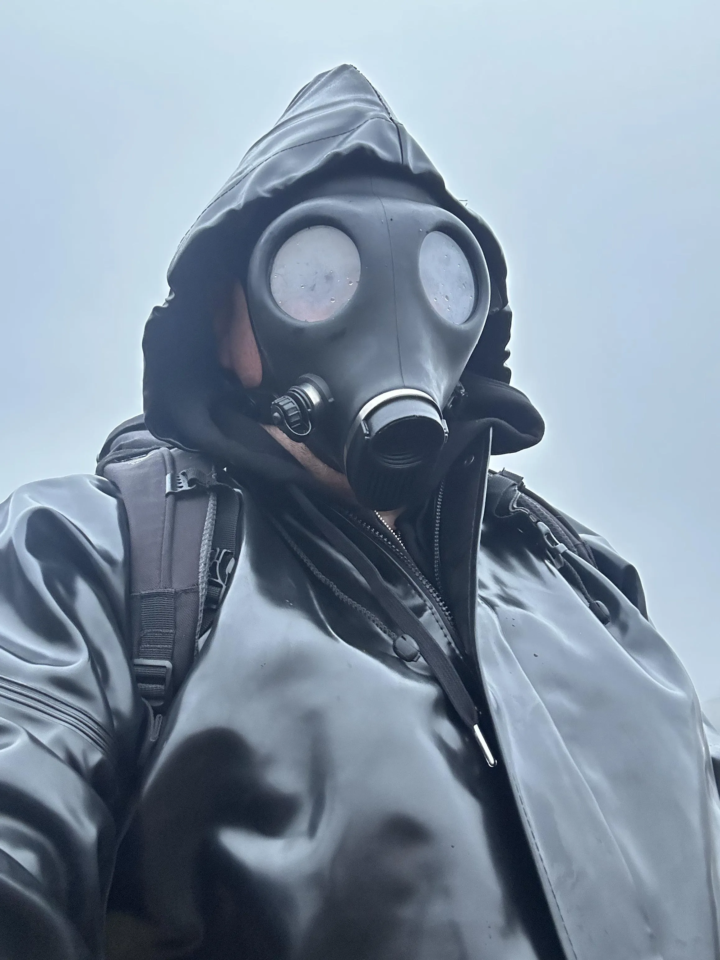 Apocalypse ready for my walk on the moors. #sbrcoat, #sbrpants, #latexcatsuitundercoat, #mistylenses, #israialgasmask, #publiclatex.