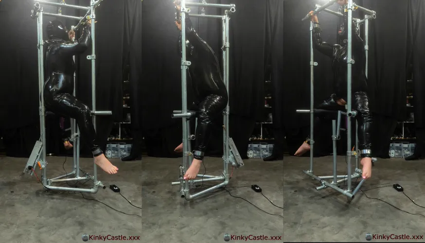 Latex doll padlocked to a spinning frame, rotated while being fucked and vibed. [OC]