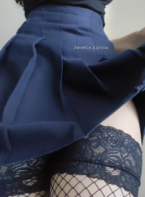 Pleated skirt and sexy stockings