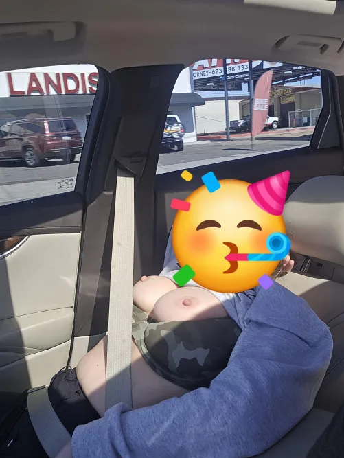 Wife taking a nap in the car