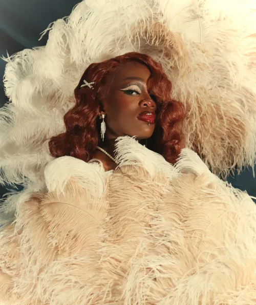 Drag queen getting into burlesque- First feather fan photoshoot!