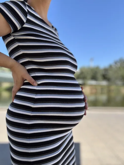 My bump and I enjoying the warm weather. Would you like to go sun bake with me?