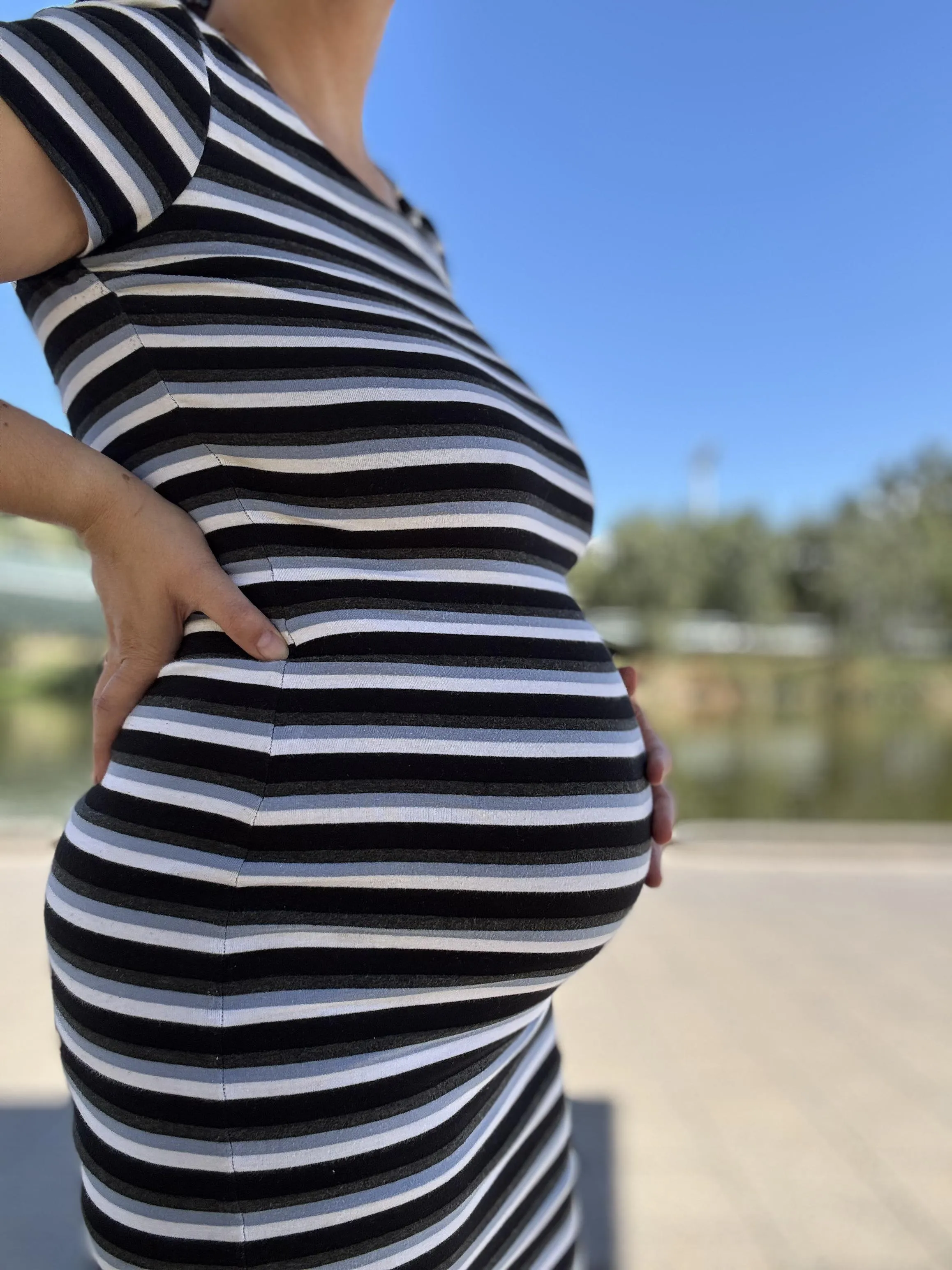 My bump and I enjoying the warm weather. Would you like to go sun bake with me?