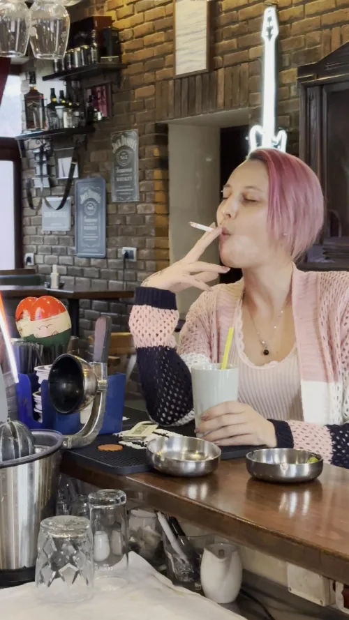 Pink hair, nicotine, and no regrets. Who’s got a light?