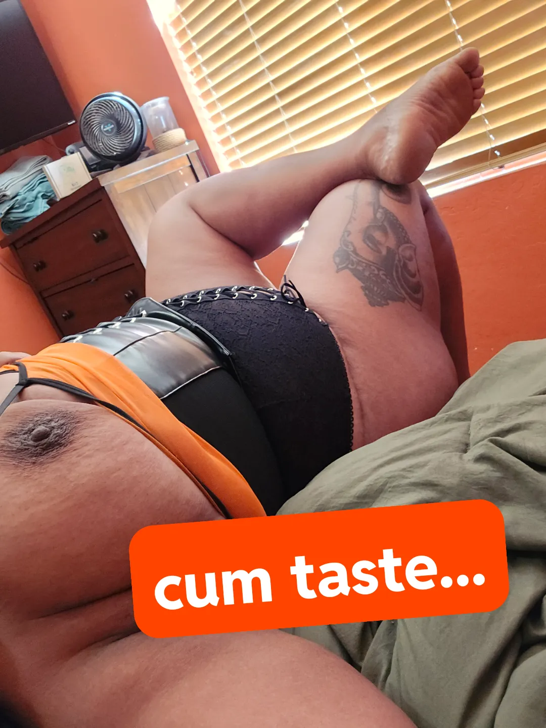 Slutty Black Milf Huge Tits and Huge Thigh Tattoo
