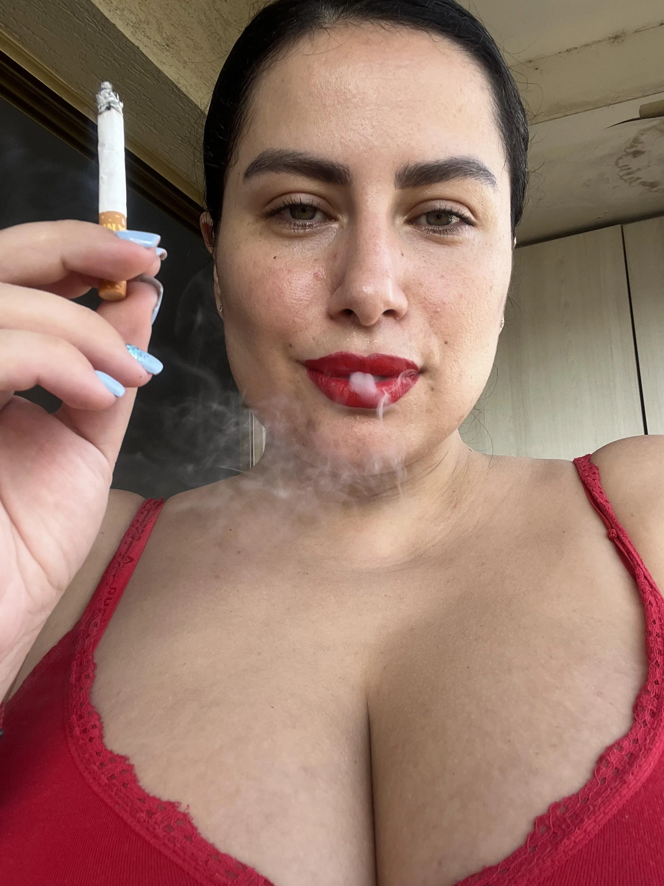 Smoking makes me feel bold, as if every breath ignites my lust for your touch