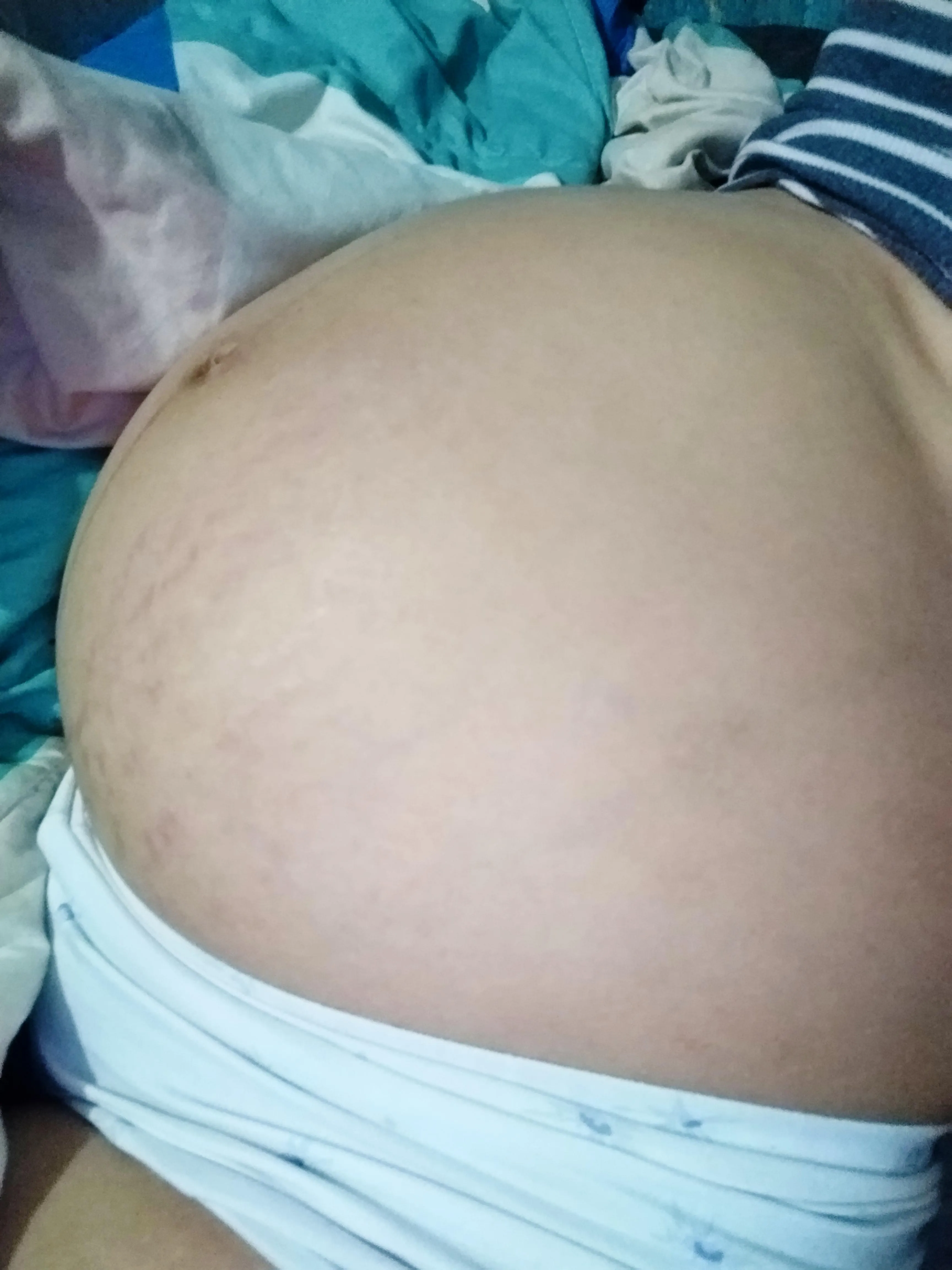 Do you want to kiss my pregnant belly?