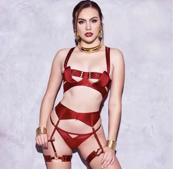 Such a striking figure in that red lingerie…