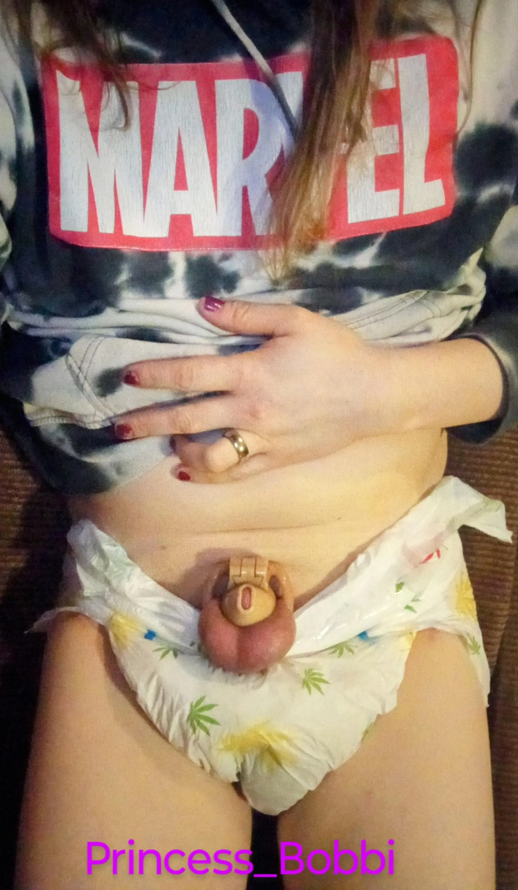 A tiny, limp, incontinent lockdd up little baby clitty, peaking out of her wet diaper habitat to wish you a good morning!