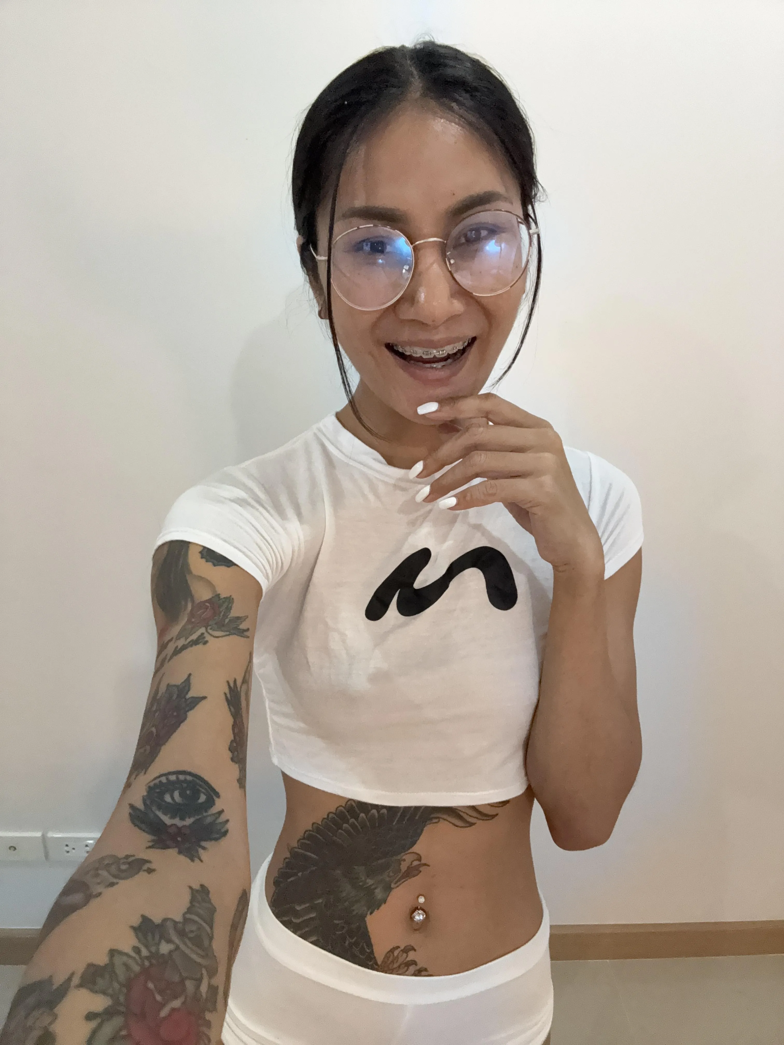 Just a girl with a bright smile and a little bit of metal