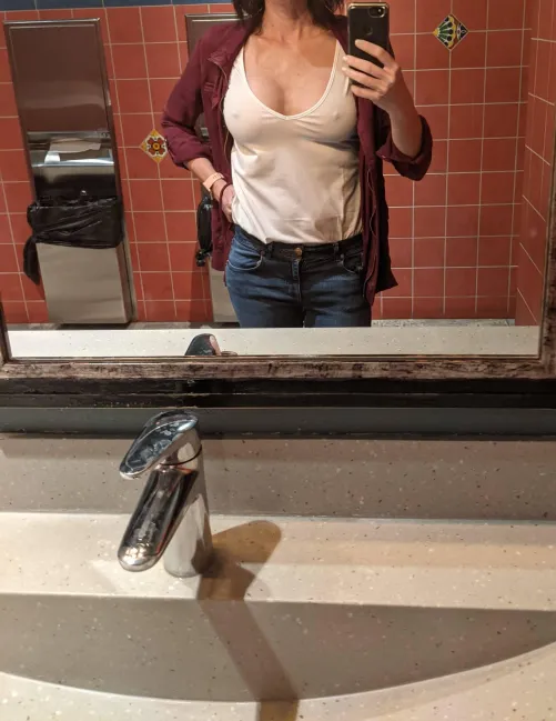 Something special about going braless in a white t-shirt