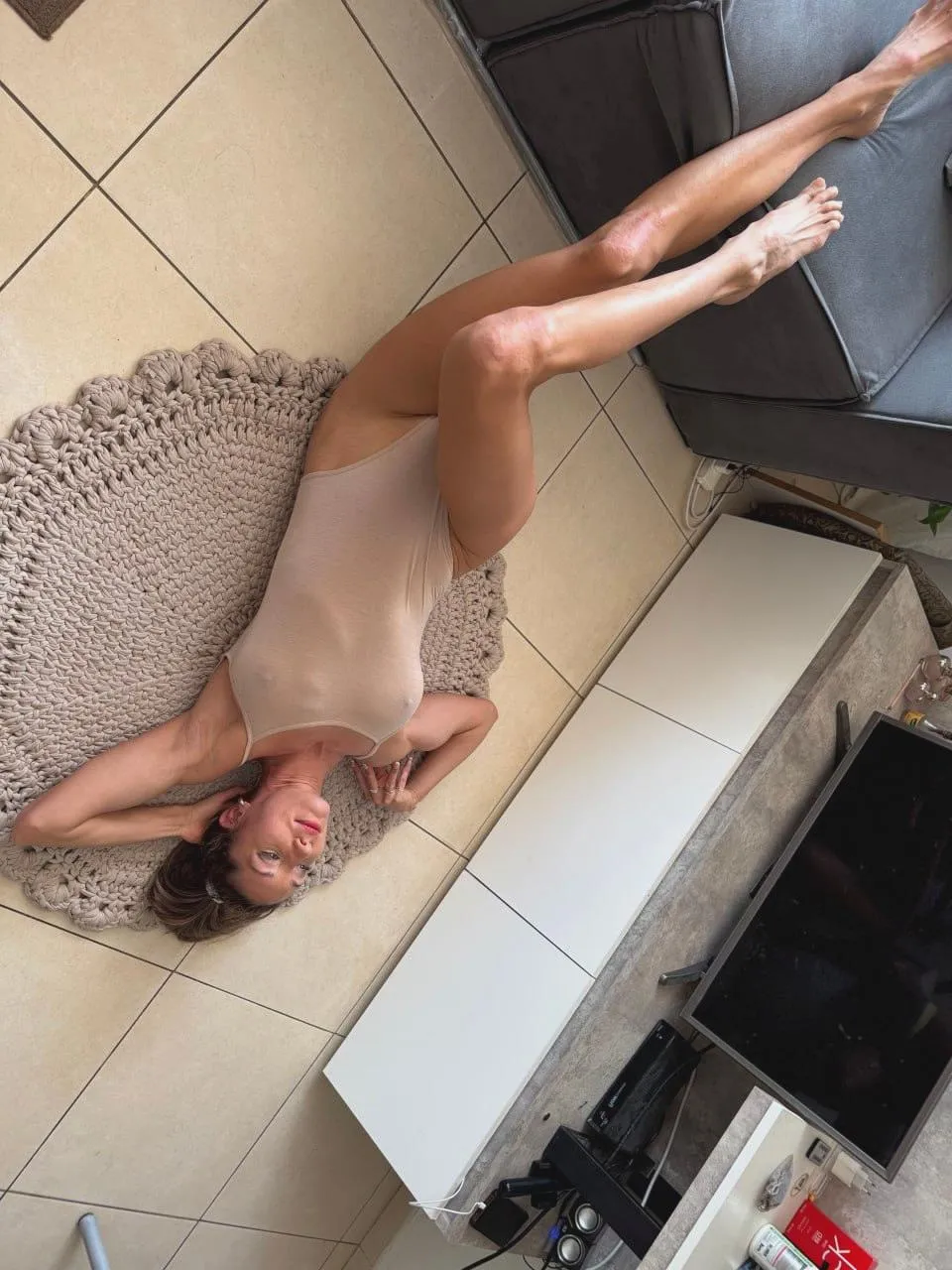 Stretching out in this one-piece suit makes me feel like a magazine model.