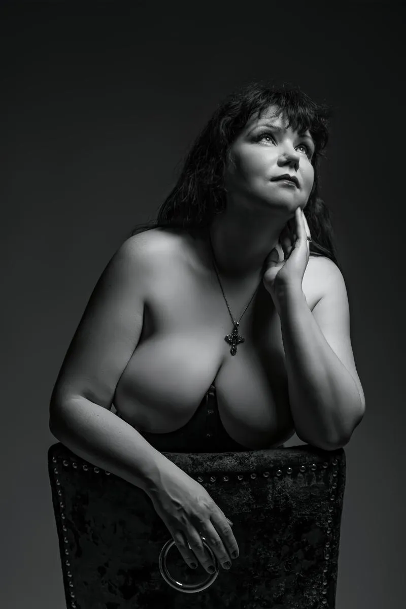 A study in light and shadow, a portrait of poise. A moment of profound reflection.