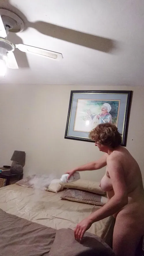 Lisa's nude in the bedroom.