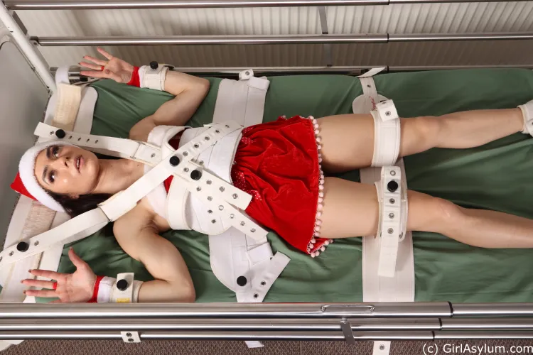 River gets restrained to a bed for Christmas: it wasn't the time for bouts of madness