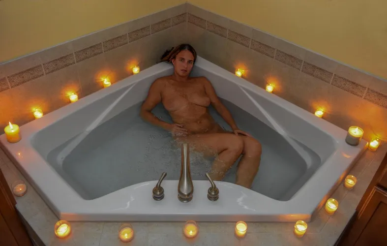 A sensual candlelit bath.