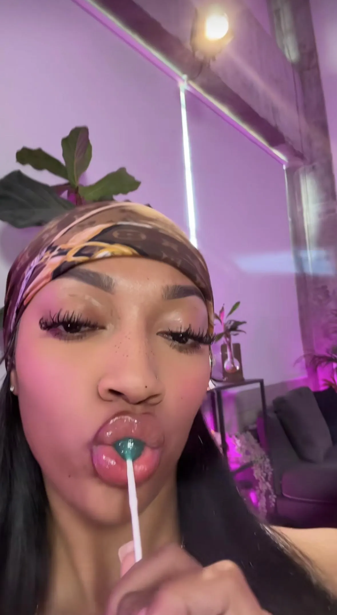 Angel sucking on a lollipop