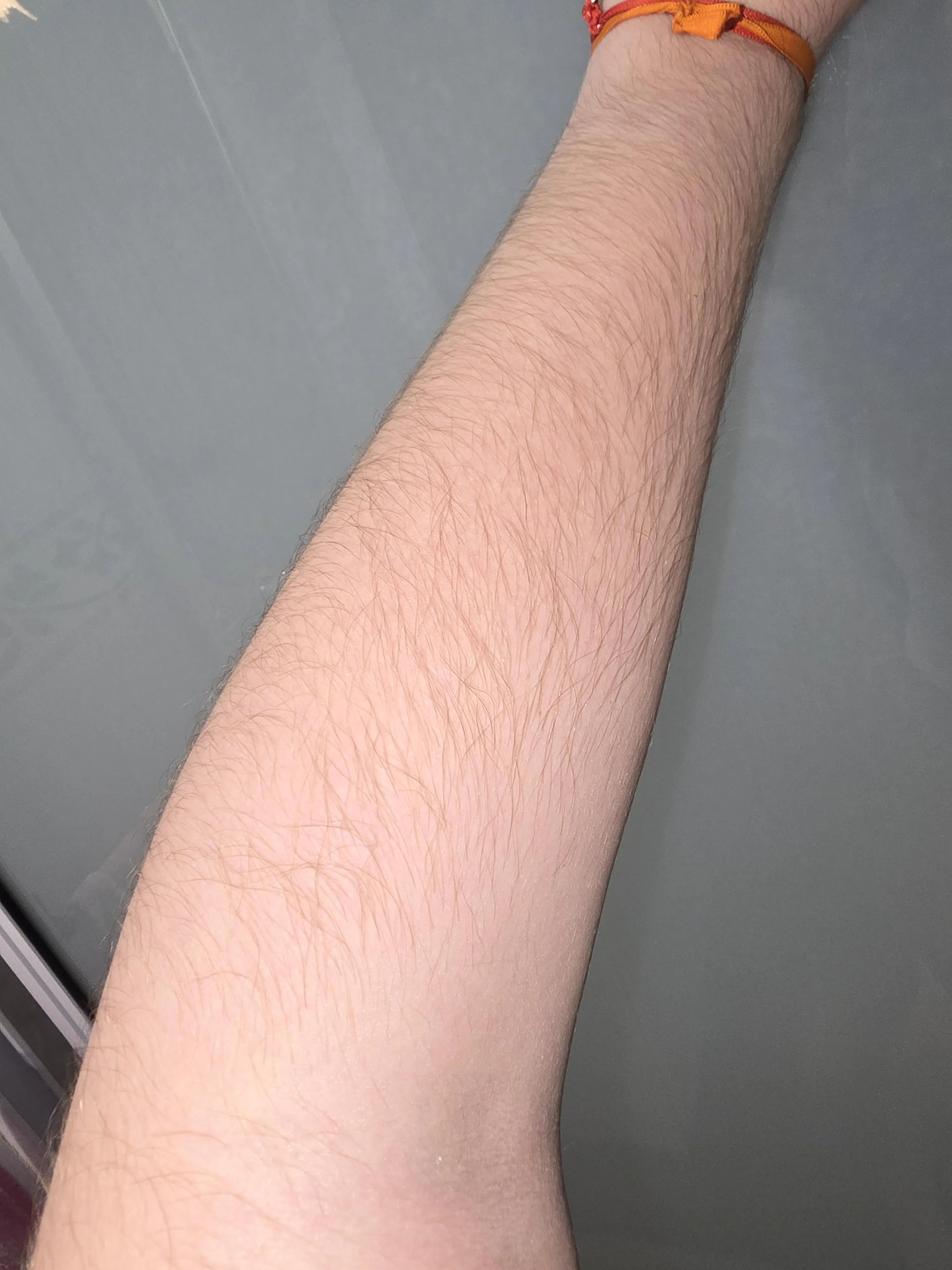 Here is a hairy fore[arms], close up