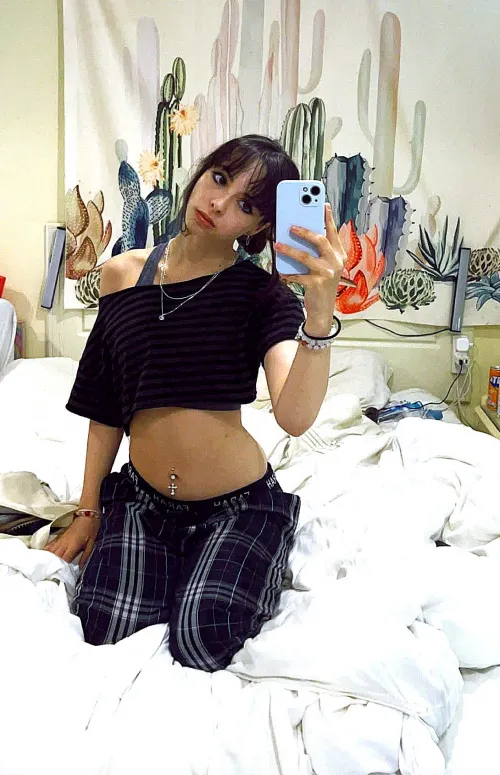 Soft curves, silver chains, and a little bit of belly charm