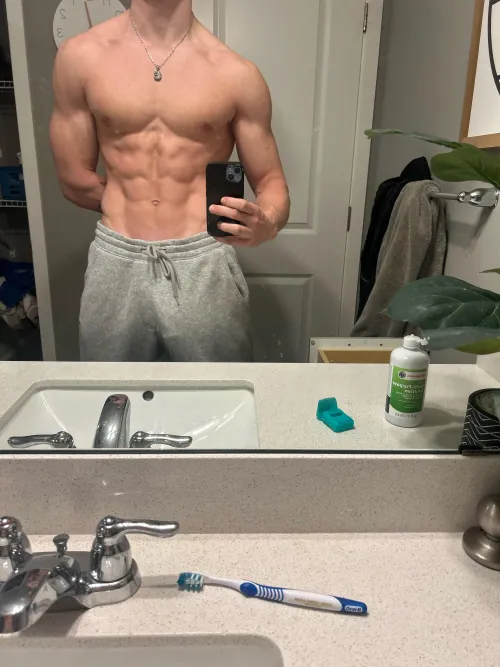 teen lifter in grey sweats