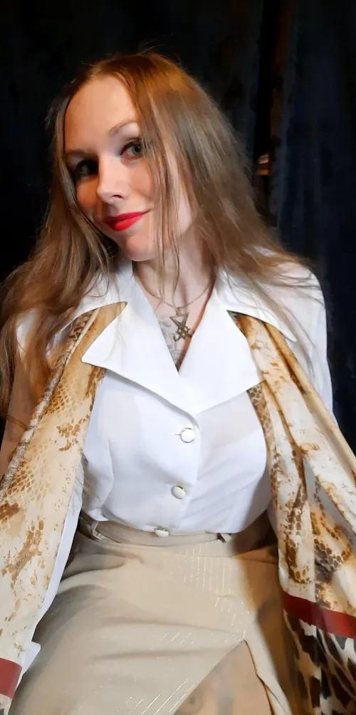 Would you pull this lady on her scarf?