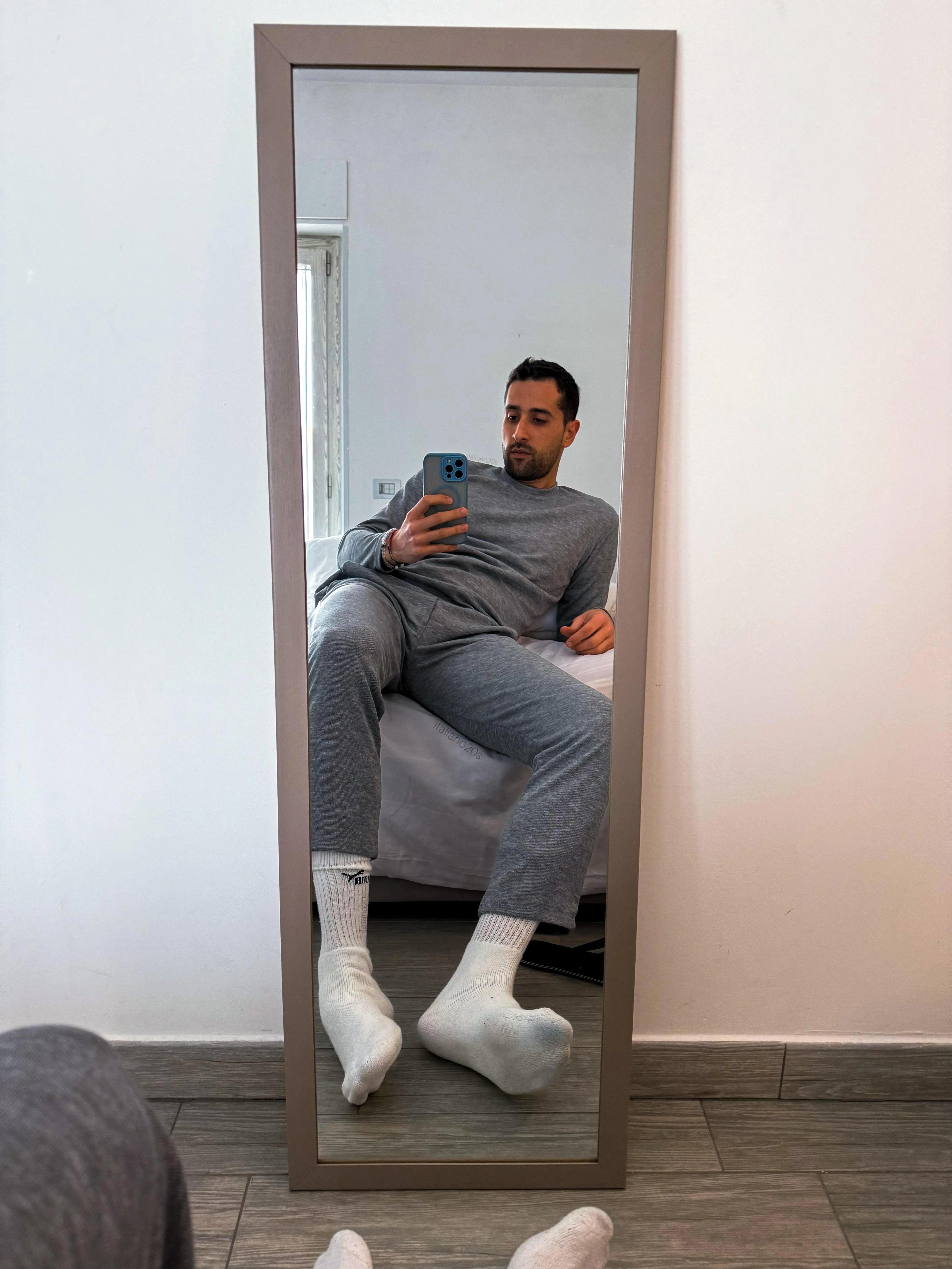 Grey pajamas, white socks and zero plans