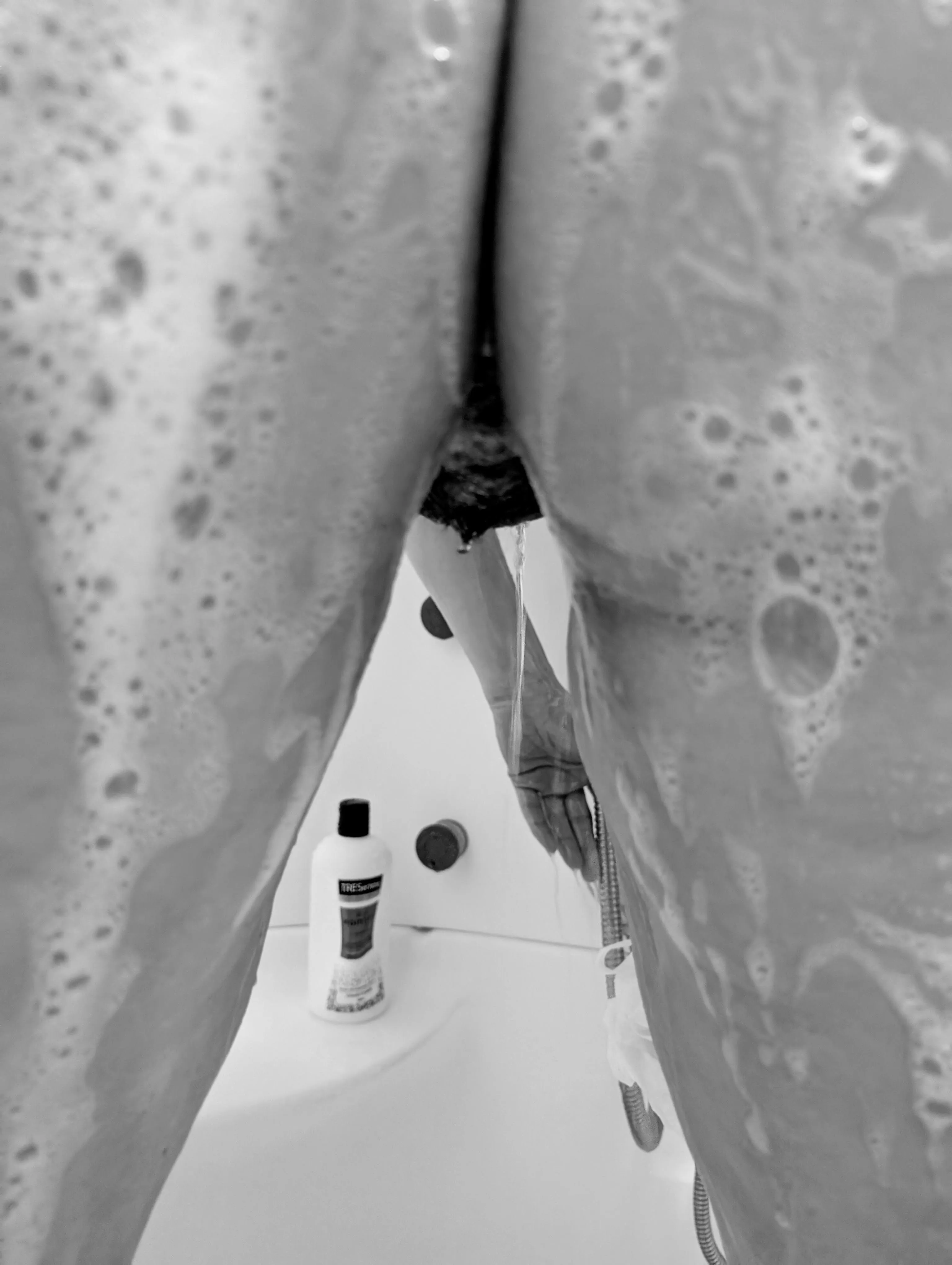 Shower, from behind.