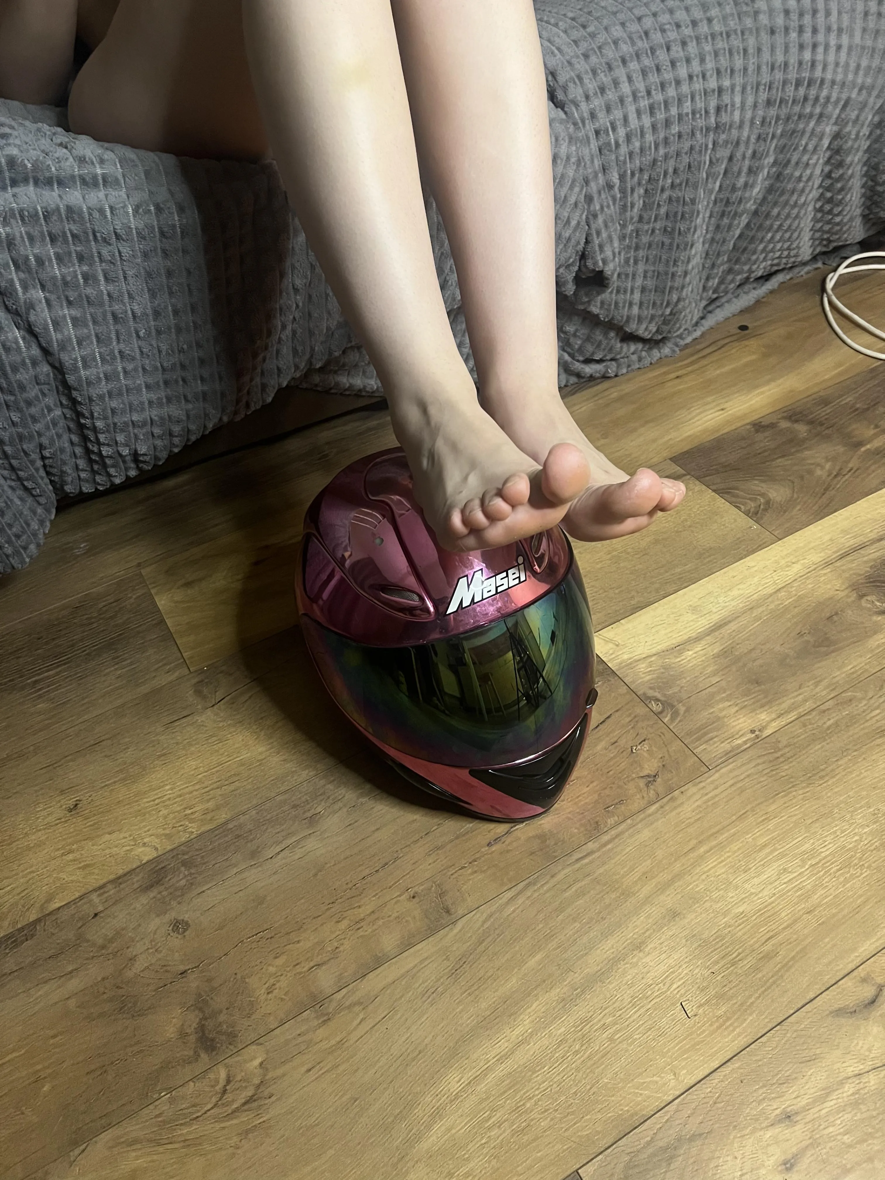 Sweet feet on a beautiful helmet