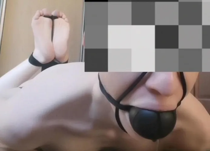 Hogtied barefoot boy with huge ball gag