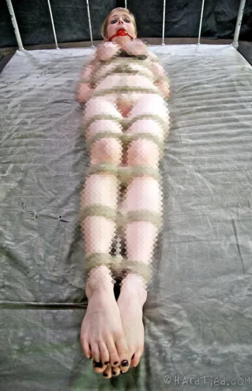 She's been here like this for quite a while... Why don't you worship her feet to make her feel more comfortable!