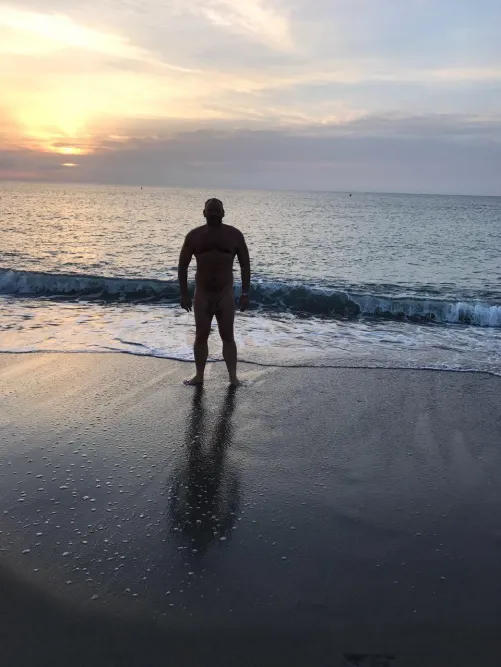 Bathing at sunrise Vera Playa Spain