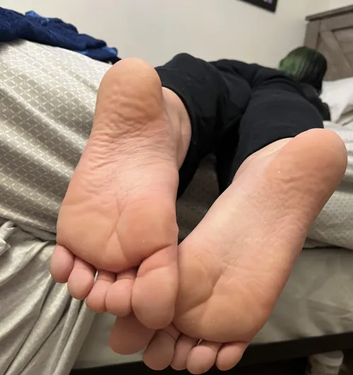 Girlfriends dangling feet