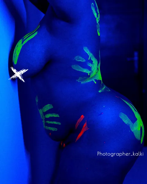 Neon painting  on curvy sexy body 